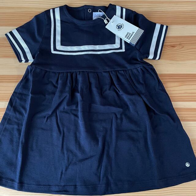 PETIT BATEAU(プチバトー)の新品未使用  プチバトー  ネイビー  フレア  ワンピース  24m キッズ/ベビー/マタニティのキッズ服女の子用(90cm~)(ワンピース)の商品写真