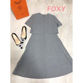 フォクシー(FOXEY)のFOXEY NEWYORK グレーワンピース　サイズ40(ひざ丈ワンピース)