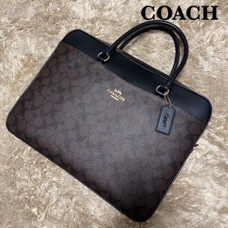 コーチ(COACH)の【美品】コーチ　ビジネスバッグ　シグネチャー　ブラウン　ショルダー紐欠品(ビジネスバッグ)