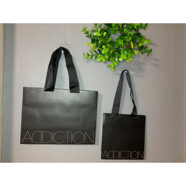 ADDICTION(アディクション)のアディクション　ショッパー　中・小2枚セット レディースのバッグ(ショップ袋)の商品写真