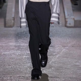 ドリスヴァンノッテン(DRIES VAN NOTEN)のdries van noten 18aw ウールフレアスラックス(スラックス)