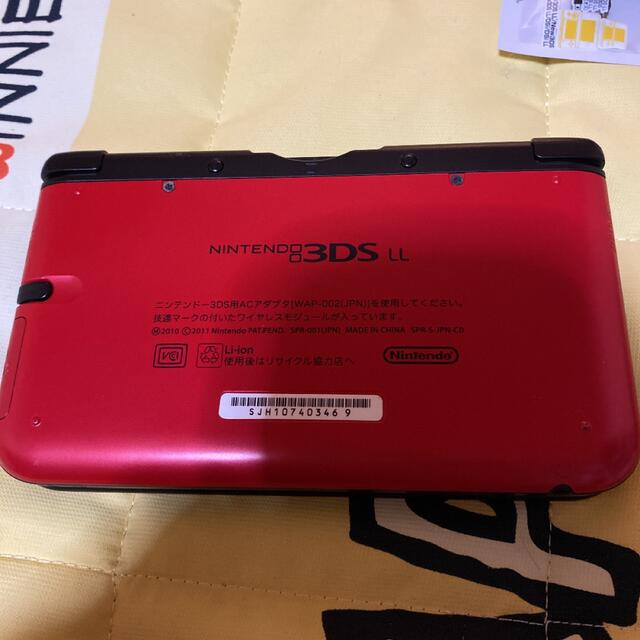 任天堂(ニンテンドウ)のNintendo 3DS  LL 本体 レッド/ブラック エンタメ/ホビーのゲームソフト/ゲーム機本体(携帯用ゲーム機本体)の商品写真