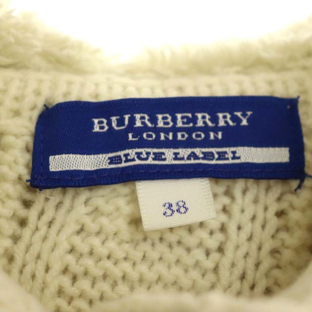 BURBERRY BLUE LABEL(バーバリーブルーレーベル)のバーバリーブルーレーベル ダッフルニットコート ミドル丈 フード アイボリー レディースのジャケット/アウター(ダッフルコート)の商品写真