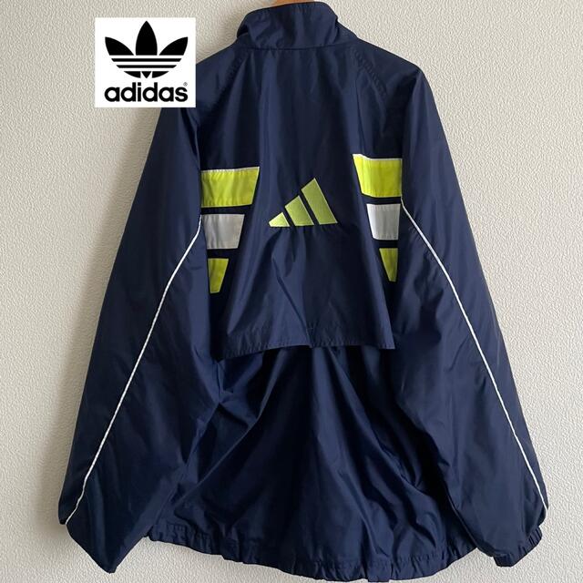 adidas(アディダス)のadidas 90s 万国旗 銀タグ ナイロンジャケット ネイビー 黄緑 USA メンズのジャケット/アウター(ナイロンジャケット)の商品写真