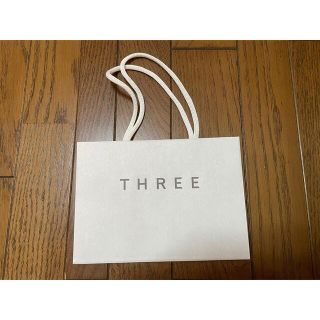 スリー(THREE)のTHREE 紙袋(ショップ袋)