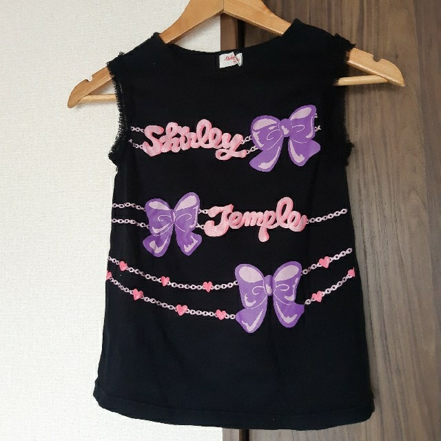 Shirley Temple(シャーリーテンプル)のShirley Temple　シャーリーテンプル　黒　リボン　ピンク　パープル レディースのトップス(カットソー(半袖/袖なし))の商品写真