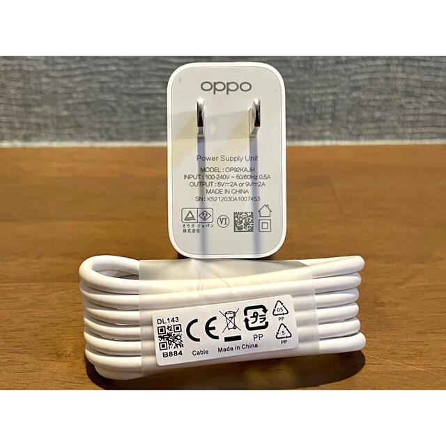 OPPO(オッポ)のOPPO 充電器 純正 microUSB（micro-B）／未使用品 スマホ/家電/カメラのスマートフォン/携帯電話(バッテリー/充電器)の商品写真