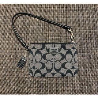 コーチ(COACH)のコーチ CORCH ポーチ オプティック・シグネチャー 黒(クラッチバッグ)