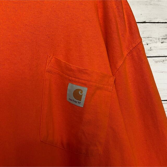 carhartt(カーハート)の【希少カラー】カーハート☆ワンポイントラベルロゴオレンジTシャツロンT メンズのトップス(Tシャツ/カットソー(七分/長袖))の商品写真