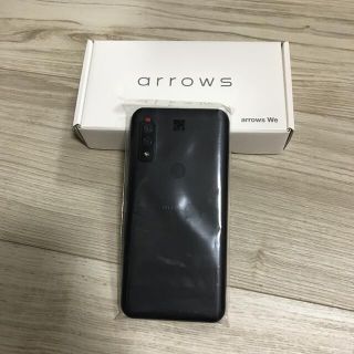 フジツウ(富士通)の未使用新品au版FCNT arrows We FCG01 ブラック充電器(スマートフォン本体)