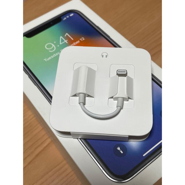 iPhone(アイフォーン)のiPhone 純正　イヤホン変換アダプター　 スマホ/家電/カメラのオーディオ機器(ヘッドフォン/イヤフォン)の商品写真