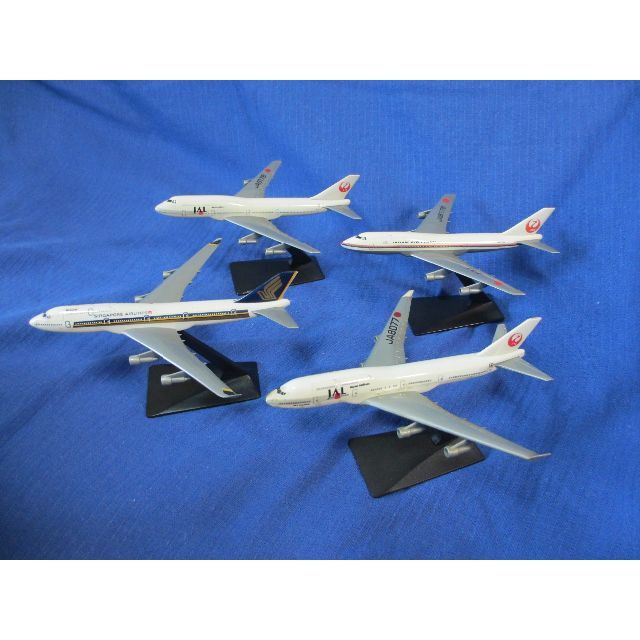 JAL(日本航空)(ジャル(ニホンコウクウ))のジャンボジェット機(JAL3機、SQ1機)の模型４機【中古】 エンタメ/ホビーのおもちゃ/ぬいぐるみ(模型/プラモデル)の商品写真