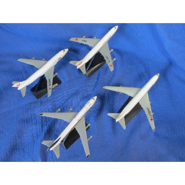 JAL(日本航空)(ジャル(ニホンコウクウ))のジャンボジェット機(JAL3機、SQ1機)の模型４機【中古】 エンタメ/ホビーのおもちゃ/ぬいぐるみ(模型/プラモデル)の商品写真