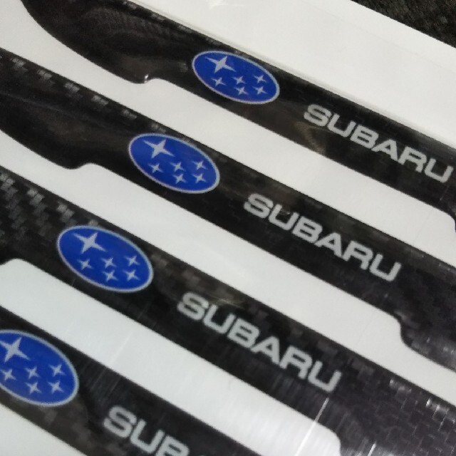 スバル(スバル)のSUBARU カーボン柄ドアプロテクターステッカー4p 自動車/バイクの自動車(車外アクセサリ)の商品写真