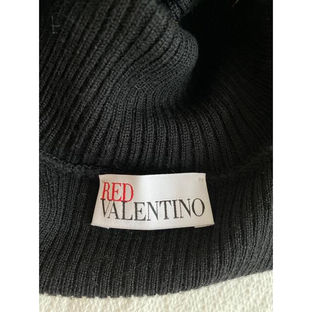 RED VALENTINO(レッドヴァレンティノ)のレッドヴァレンティノ　　タートルニット　リボンニット　ブラック　バレンチノ レディースのトップス(シャツ/ブラウス(半袖/袖なし))の商品写真
