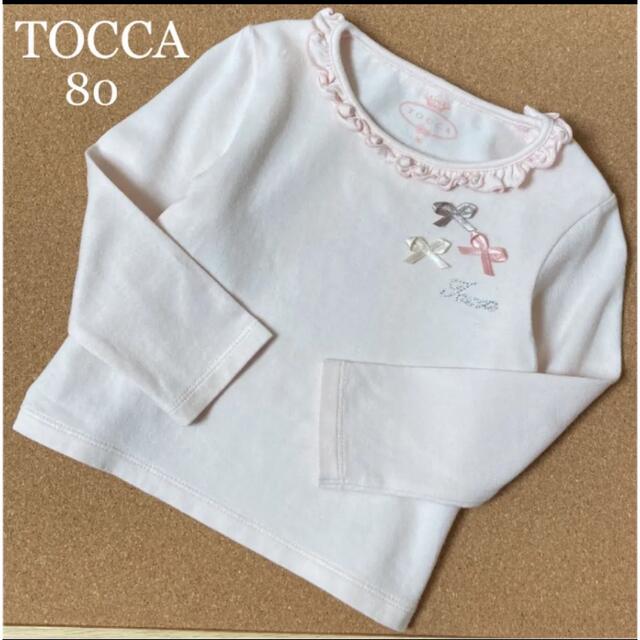 TOCCA(トッカ)のTOCCA トッカ　長袖　シャツ　ロンT キラキラ　ロゴ　リボン　春　メゾピアノ キッズ/ベビー/マタニティのベビー服(~85cm)(シャツ/カットソー)の商品写真