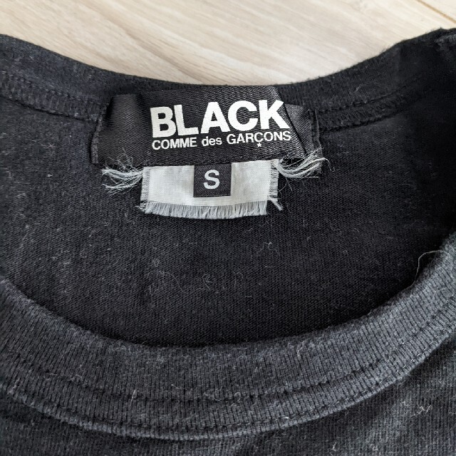 BLACK COMME des GARCONS(ブラックコムデギャルソン)のBLACK COMME des GARCONS AD2015　アイプリント レディースのトップス(Tシャツ(半袖/袖なし))の商品写真