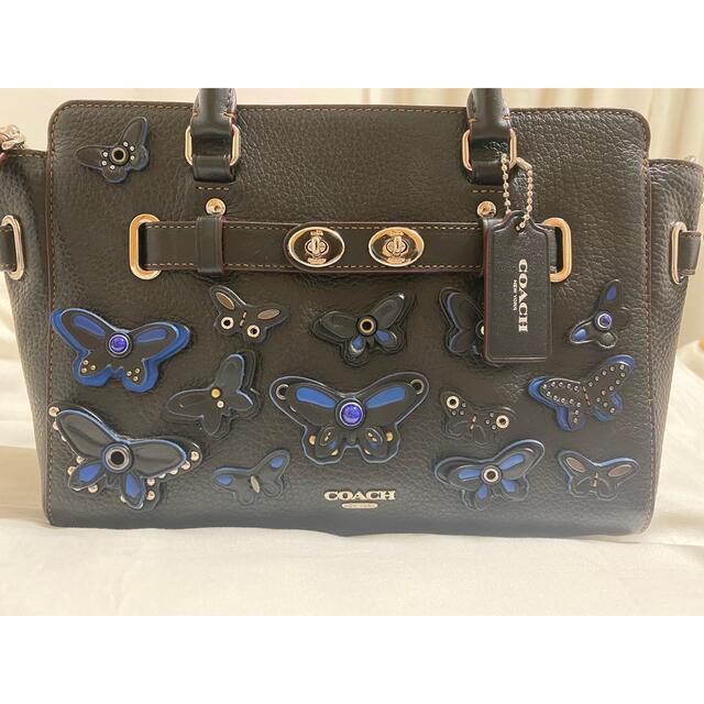 レディースcoach バタフライアップリケハンドバッグ