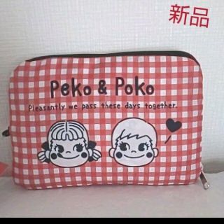 サンリオ(サンリオ)のPEKO様 専用　です。新品 未使用 タグ付 ペコちゃん ポケッタブル リュック(エコバッグ)