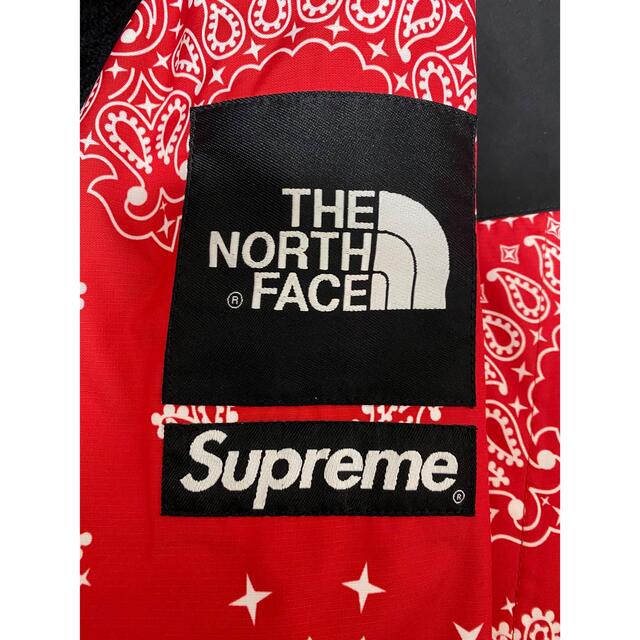 Supreme(シュプリーム)のsupreme the north face bandana red S メンズのジャケット/アウター(マウンテンパーカー)の商品写真