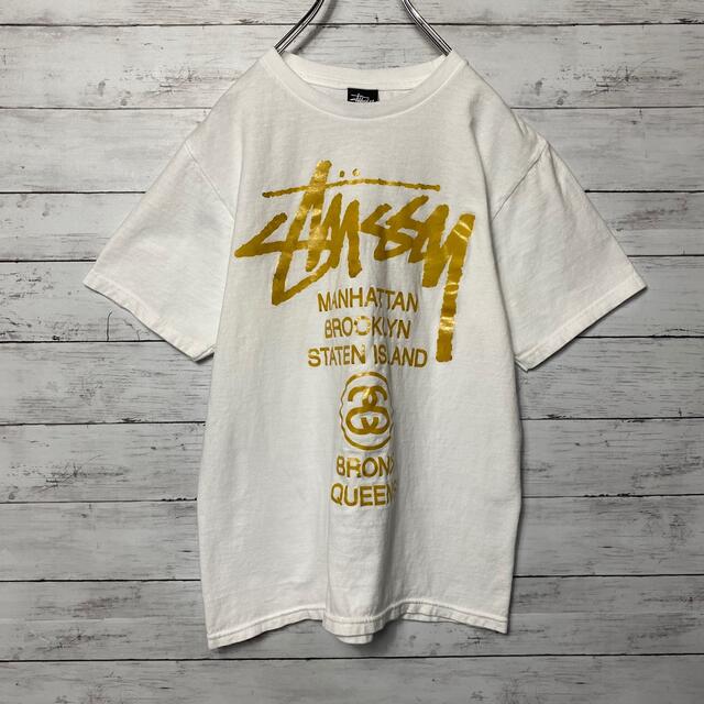 STUSSY(ステューシー)の【人気カラー】ステューシー☆Tシャツホワイトビッグロゴゴールド メンズのトップス(Tシャツ/カットソー(半袖/袖なし))の商品写真