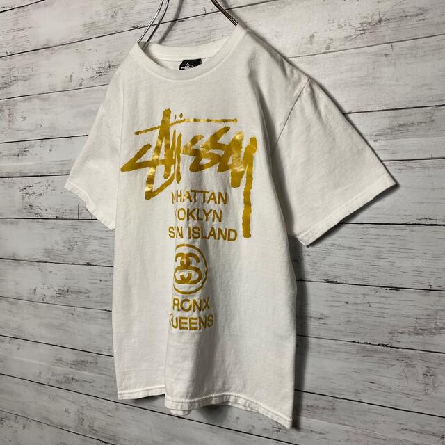 STUSSY(ステューシー)の【人気カラー】ステューシー☆Tシャツホワイトビッグロゴゴールド メンズのトップス(Tシャツ/カットソー(半袖/袖なし))の商品写真