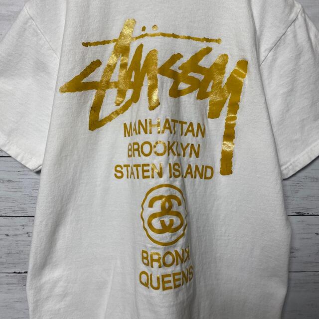 STUSSY(ステューシー)の【人気カラー】ステューシー☆Tシャツホワイトビッグロゴゴールド メンズのトップス(Tシャツ/カットソー(半袖/袖なし))の商品写真