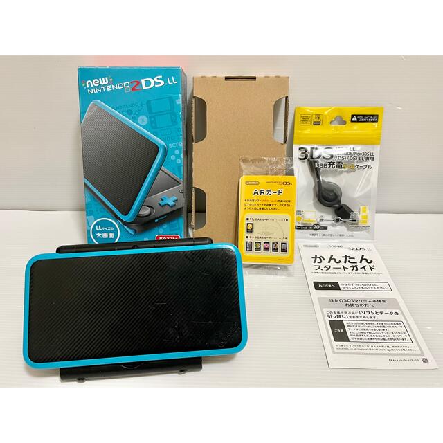 ニンテンドー2DS(ニンテンドー2DS)の【箱付き】 Newニンテンドー2DS LL ブラック×ターコイズ  任天堂 エンタメ/ホビーのゲームソフト/ゲーム機本体(携帯用ゲーム機本体)の商品写真