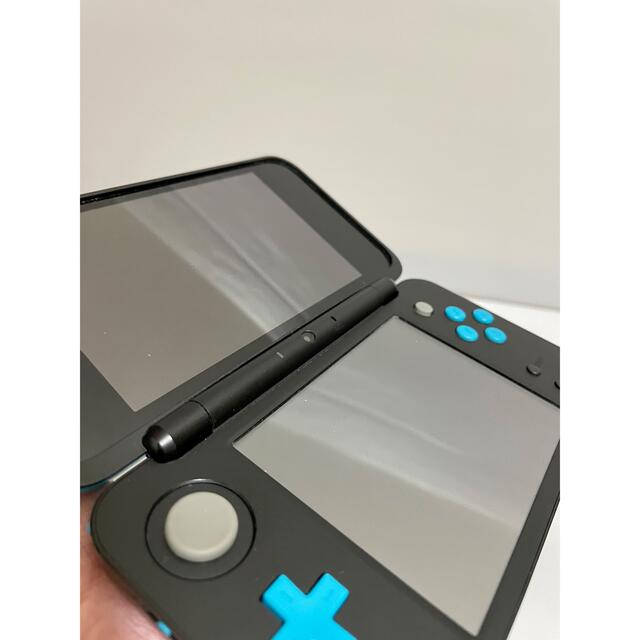 ニンテンドー2DS(ニンテンドー2DS)の【箱付き】 Newニンテンドー2DS LL ブラック×ターコイズ  任天堂 エンタメ/ホビーのゲームソフト/ゲーム機本体(携帯用ゲーム機本体)の商品写真