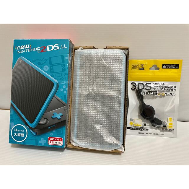 ニンテンドー2DS(ニンテンドー2DS)の【箱付き】 Newニンテンドー2DS LL ブラック×ターコイズ  任天堂 エンタメ/ホビーのゲームソフト/ゲーム機本体(携帯用ゲーム機本体)の商品写真