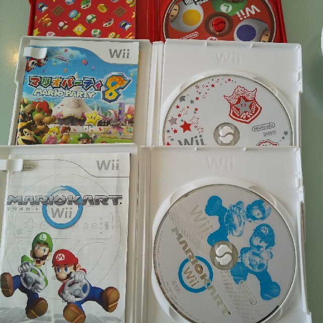 Wii(ウィー)のwii　リモコン　ハンドル　ソフト　一式 エンタメ/ホビーのゲームソフト/ゲーム機本体(家庭用ゲームソフト)の商品写真