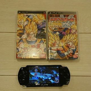 プレイステーションポータブル(PlayStation Portable)の良品☆psp2000 本体☆黒。新品バッテリー、ゲーム２つ付き。(携帯用ゲーム機本体)