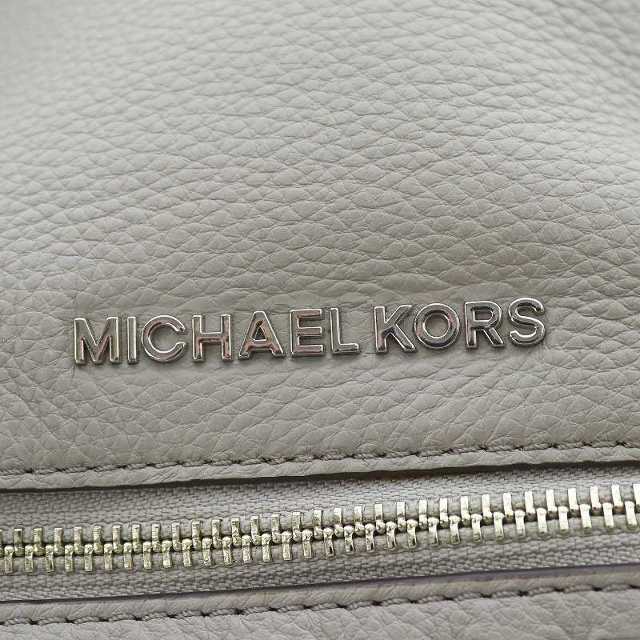 Michael Kors(マイケルコース)のマイケルコース リュックサック デイパック ロゴ スタッズ レザー グレー レディースのバッグ(リュック/バックパック)の商品写真