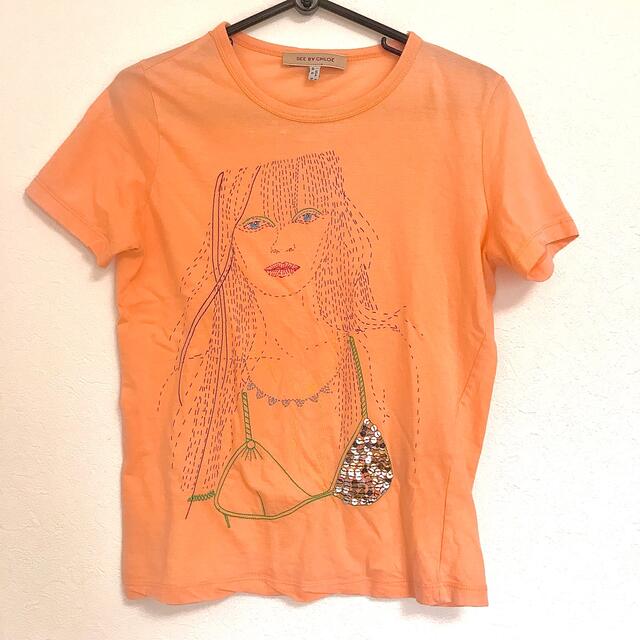 SEE BY CHLOE(シーバイクロエ)のシーバイクロエ　半袖Tシャツ　顔　オレンジ系 レディースのトップス(Tシャツ(半袖/袖なし))の商品写真