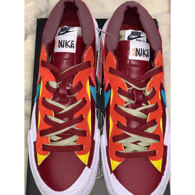 sacai(サカイ)のKAWS × sacai × Nike Blazer Low Team Red" メンズの靴/シューズ(スニーカー)の商品写真