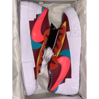 サカイ(sacai)のKAWS × sacai × Nike Blazer Low Team Red"(スニーカー)