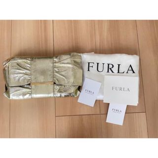 フルラ(Furla)の✳︎新品未使用　フルラ　本革クラッチバッグ　ゴールド　イタリア製(クラッチバッグ)