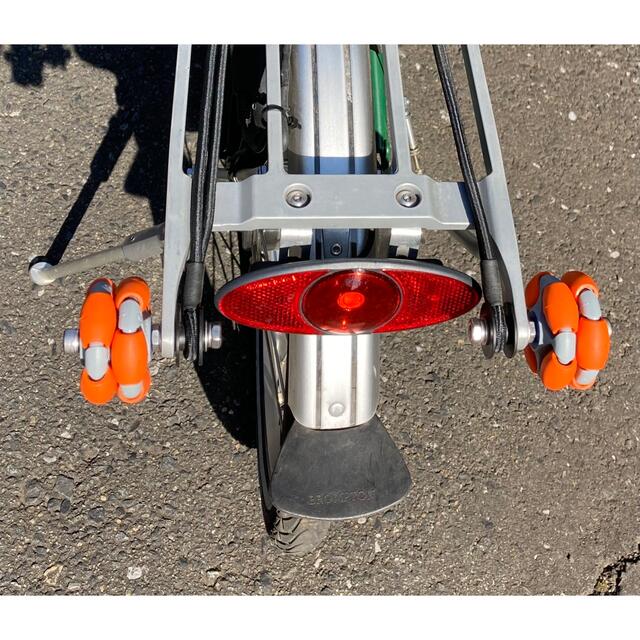 BROMPTON(ブロンプトン)のオムニホイール(残1)オレンジ　方向転換が360度自由自在。輪行の季節到来です。 スポーツ/アウトドアの自転車(パーツ)の商品写真
