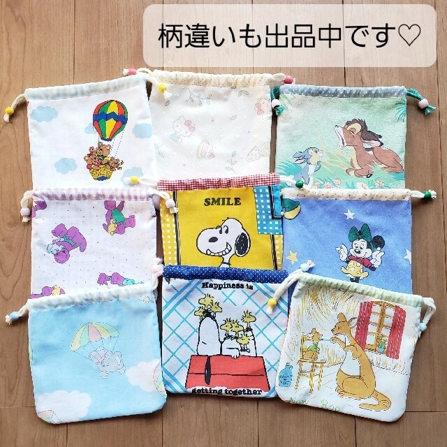 SNOOPY(スヌーピー)のハンドメイド スヌーピー 巾着袋巾着ポーチコップ袋給食袋ヴィンテージシーツ ハンドメイドのファッション小物(ポーチ)の商品写真