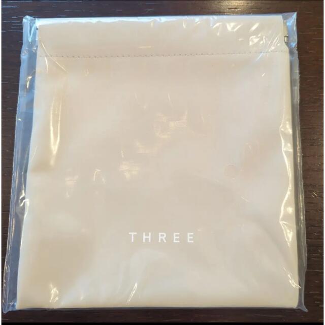 THREE(スリー)のTHREE フラットマルチケース　新品未開封品 レディースのファッション小物(ポーチ)の商品写真