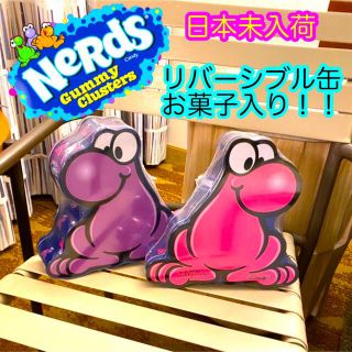 コストコ(コストコ)のレア新品🍭NeRdsのシルエット缶🌈リバーシブルデザイン　ナーズお菓子いり(キャラクターグッズ)