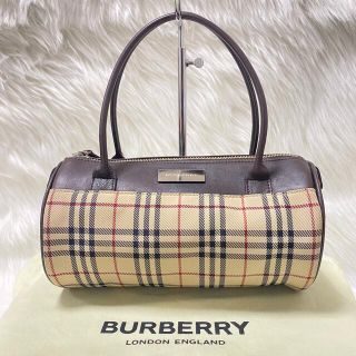 バーバリー(BURBERRY) 革 バッグの通販 900点以上 | バーバリーの 国連安保理が ほぼ未使用⭐ バーバリー ハンドバッグ ミニ ドラム 筒 ノバチェック ハンドバッグ