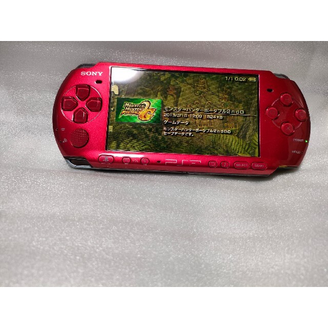 PSP3000レッド エンタメ/ホビーのゲームソフト/ゲーム機本体(携帯用ゲーム機本体)の商品写真