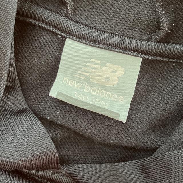 New Balance(ニューバランス)のnew balance 長袖　パーカー　蛍光　オレンジ✖️黒　140cm キッズ/ベビー/マタニティのキッズ服男の子用(90cm~)(ジャケット/上着)の商品写真