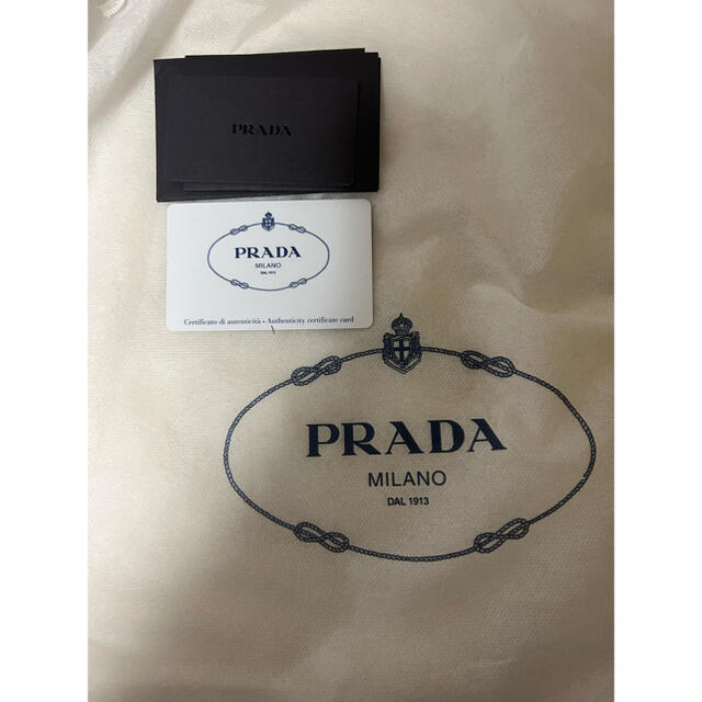 ホワイト PRADA カナパの通販 by みみ's shop|プラダならラクマ ...