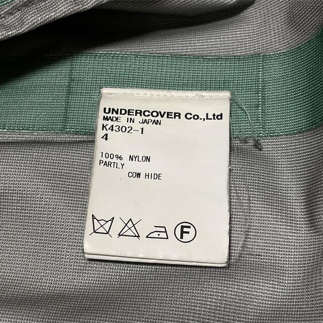 UNDERCOVER(アンダーカバー)の【希少】UNDERCOVERISM GORETEX fuck ステンカラーコート メンズのジャケット/アウター(ステンカラーコート)の商品写真