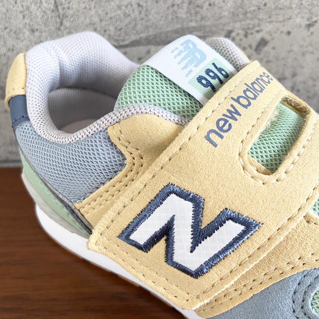 New Balance(ニューバランス)の【新品】15センチ イエロー×ブルー ニューバランス スニーカー キッズ キッズ/ベビー/マタニティのキッズ靴/シューズ(15cm~)(スニーカー)の商品写真