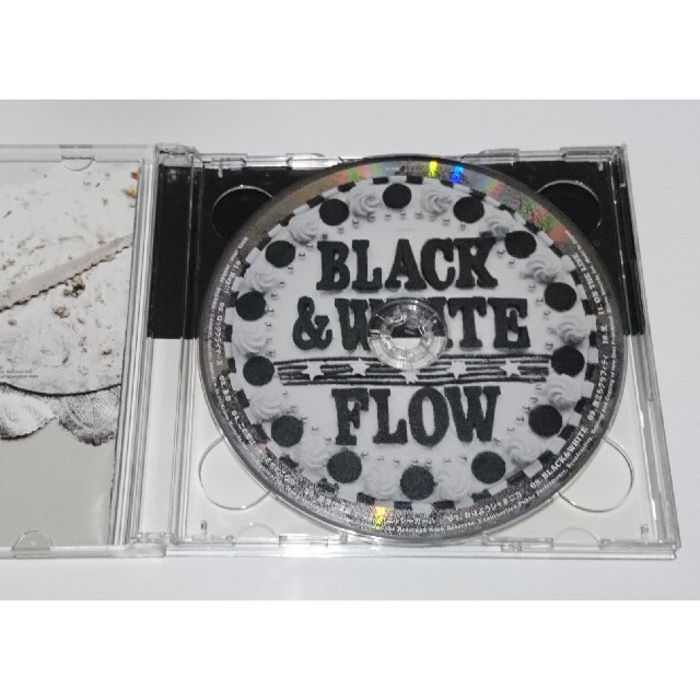 FLOW(フロー)の初回生産限定盤☆BLACK & WHITE　/FLOW 7thアルバム（フロウ エンタメ/ホビーのCD(ポップス/ロック(邦楽))の商品写真