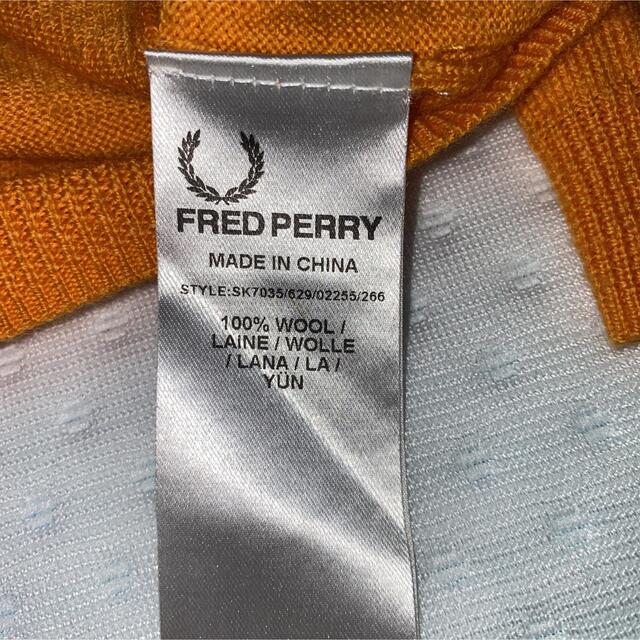 FRED PERRY(フレッドペリー)のRAF SIMONS. FRED PERRYコラボセーターオレンジ日本サイズM メンズのトップス(ニット/セーター)の商品写真