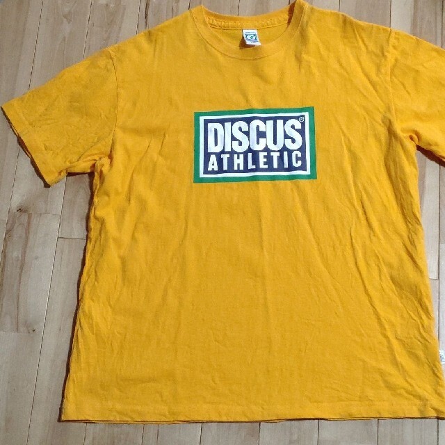 DISCUS(ディスカス)の美品　DISCUS　Tシャツ オレンジ　サイズXL メンズのトップス(Tシャツ/カットソー(半袖/袖なし))の商品写真